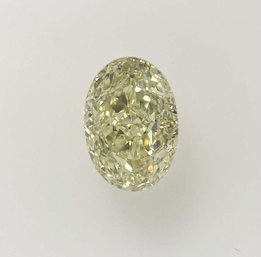 Loose Diamond - OVAL 1.2ct Fancy Light Yellow VVS2: Loose Diamond - OVAL 1.2ct Fancy Light Yellow VVS2 Source: Natural Shape: OVAL Carats: 1.2 Color: Fancy Light Yellow Certification: GIA PLEASE NOTE: Framed, Large, or heavy items do not have shipping 