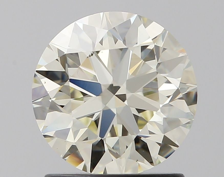 Loose Diamond - ROUND 1.34ct K VS1: Loose Diamond - ROUND 1.34ct K VS1 Source: Natural Shape: ROUND Carats: 1.34 Color: K Clarity: VS1 Certification: IGI Video: