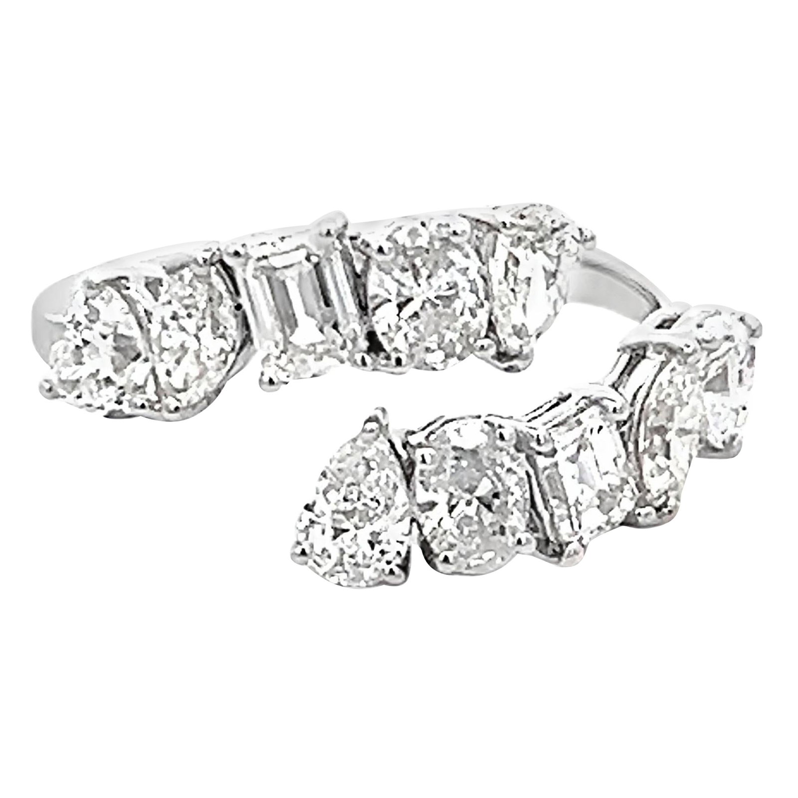 1.92ct Multi Diamond Bypass Ring 18k White Gold: 1.92ct Multi Diamond Bypass Ring 18k White Gold This stunning modern bypass ring features a total diamond weight of 1.92 carats and is crafted from high-quality 18k white gold. The ring showcases a un