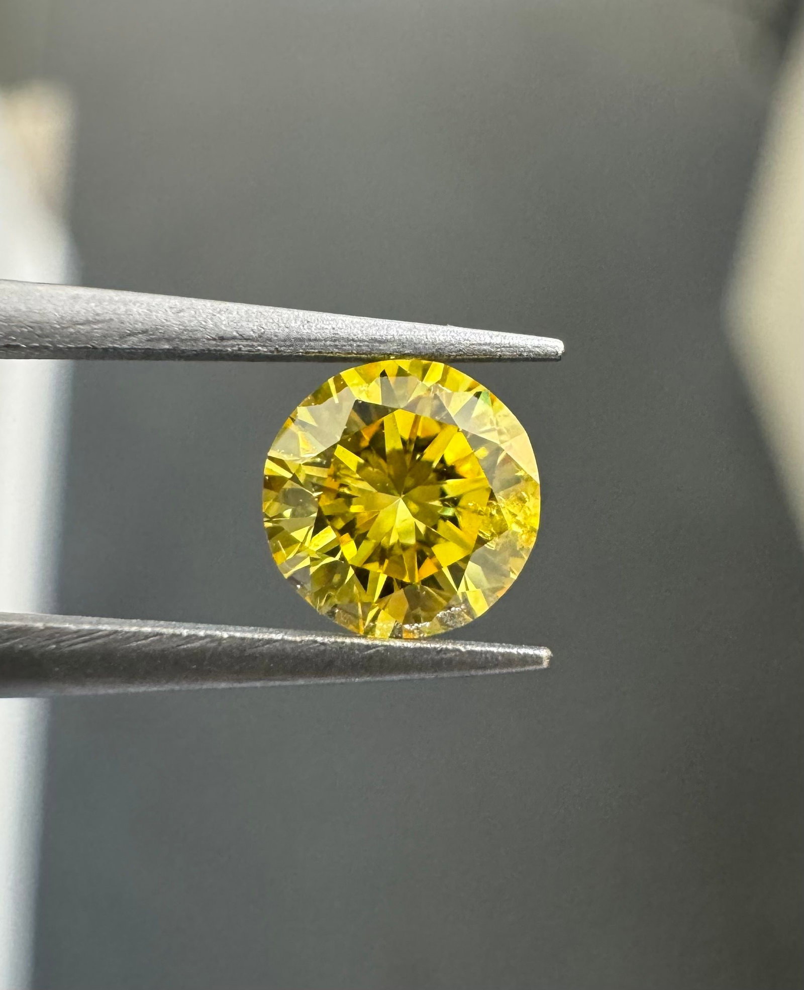 Loose Diamond - ROUND 0.21ct Fancy Vivid Yellow I2: Loose Diamond - ROUND 0.21ct Fancy Vivid Yellow I2 Source: Natural Shape: ROUND Carats: 0.21 Color: Fancy Vivid Yellow Certification: GIA Video: