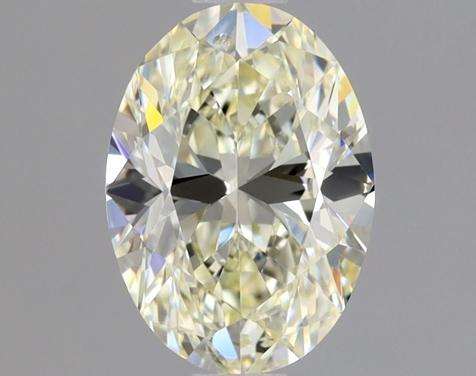 Loose Diamond - OVAL 1.01ct M SI2: Loose Diamond - OVAL 1.01ct M SI2 Source: Natural Shape: OVAL Carats: 1.01 Color: M Clarity: SI2 Certification: GIA Video:
