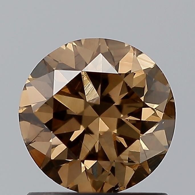 Loose Diamond - ROUND 0.92ct Brown SI1: Loose Diamond - ROUND 0.92ct Brown SI1 Source: Natural Shape: ROUND Carats: 0.92 Color: Brown Certification: NONE Video: