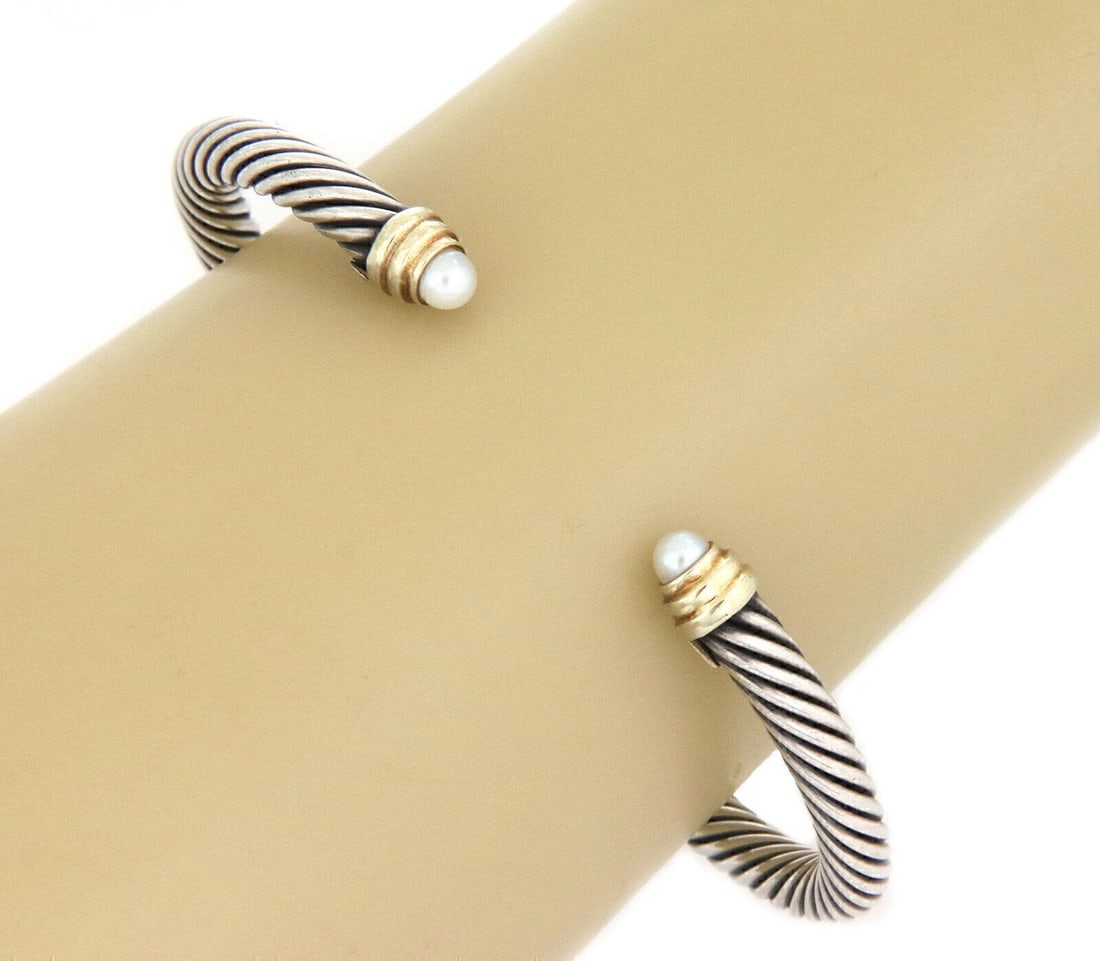 David Yurman Cable Classic Pearl Cuff Bracelet Sterling Silver 14k Gold: David Yurman Cable Classic Pearl Cuff Bracelet Sterling Silver 14k Gold This authentic David Yurman Cable Classic Cuff Bracelet features the designer's iconic twisted cable motif, crafted in sterling 