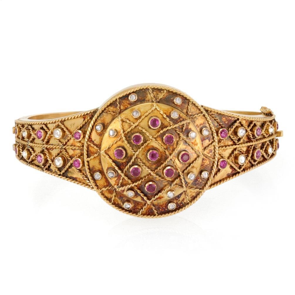 Victorian 1.75ct Rose Cut Diamond Ruby Bracelet in 18k Gold: Victorian 1.75ct Rose Cut Diamond Ruby Bracelet in 18k Gold This exquisite Victorian Era bracelet is beautifully crafted from 18k yellow gold. It features a striking double round top medallion design,