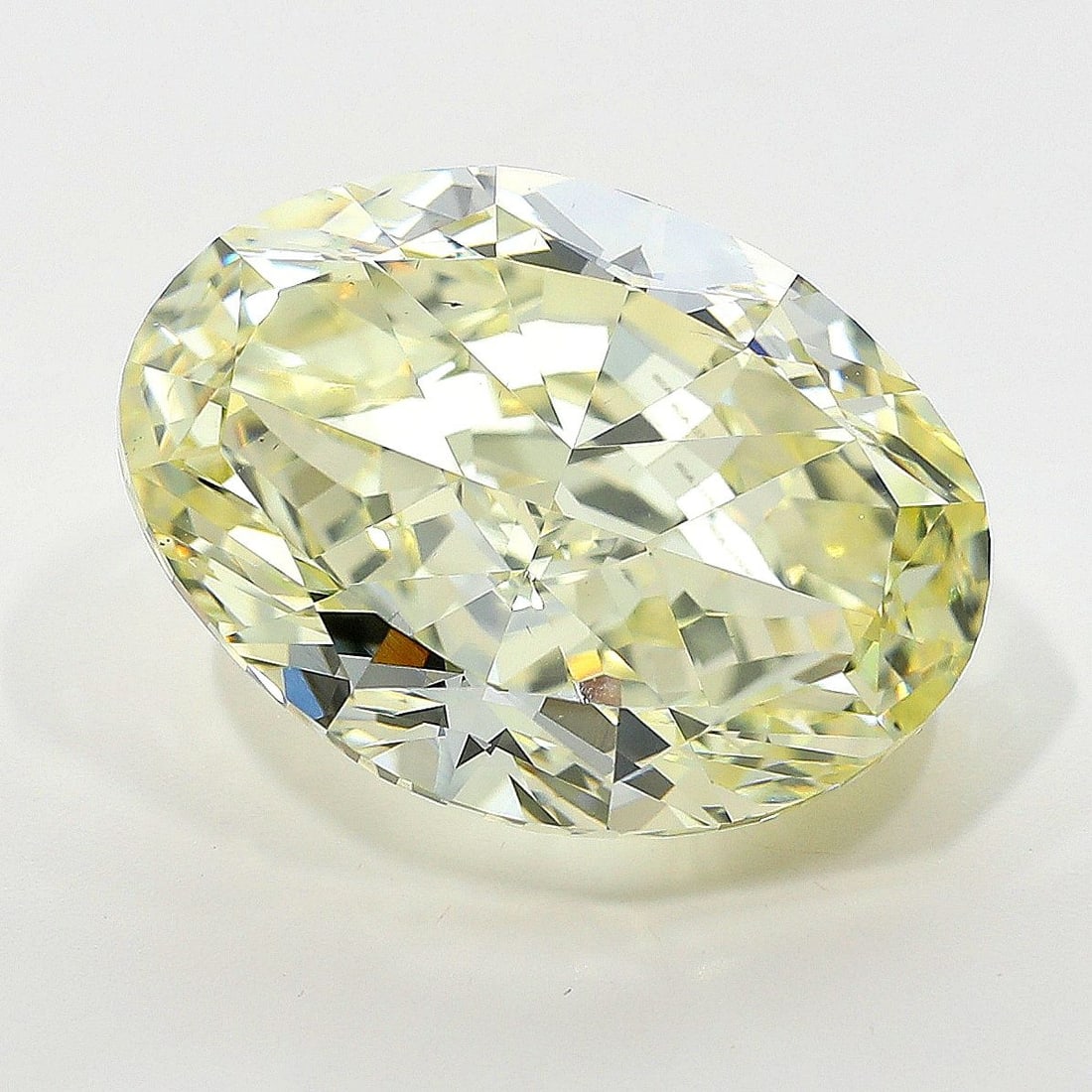 Loose Diamond - OVAL 6.02ct Fancy Light Yellow VS2: Loose Diamond - OVAL 6.02ct Fancy Light Yellow VS2 Source: Natural Shape: OVAL Carats: 6.02 Color: Fancy Light Yellow Certification: GIA PLEASE NOTE: Framed, Large, or heavy items do not have shipping
