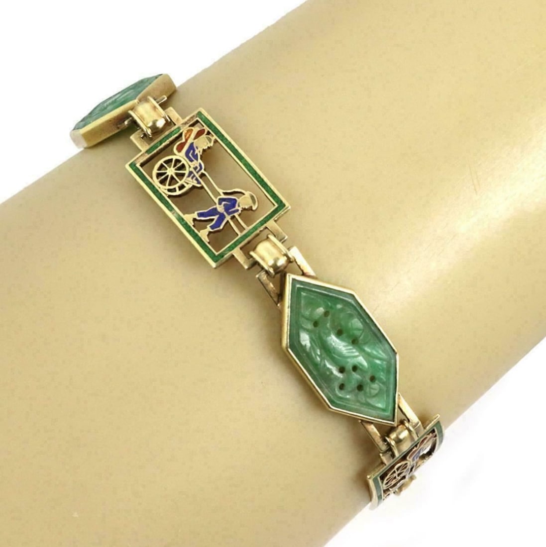 Enos Richardson 14k Yellow Gold Jade Enamel Link Bracelet: Enos Richardson 14k Yellow Gold Jade Enamel Link Bracelet This vintage open link bracelet features luminous jade accents and vibrant multi-color enamel detailing, all set in rich 14k yellow gold. Craf