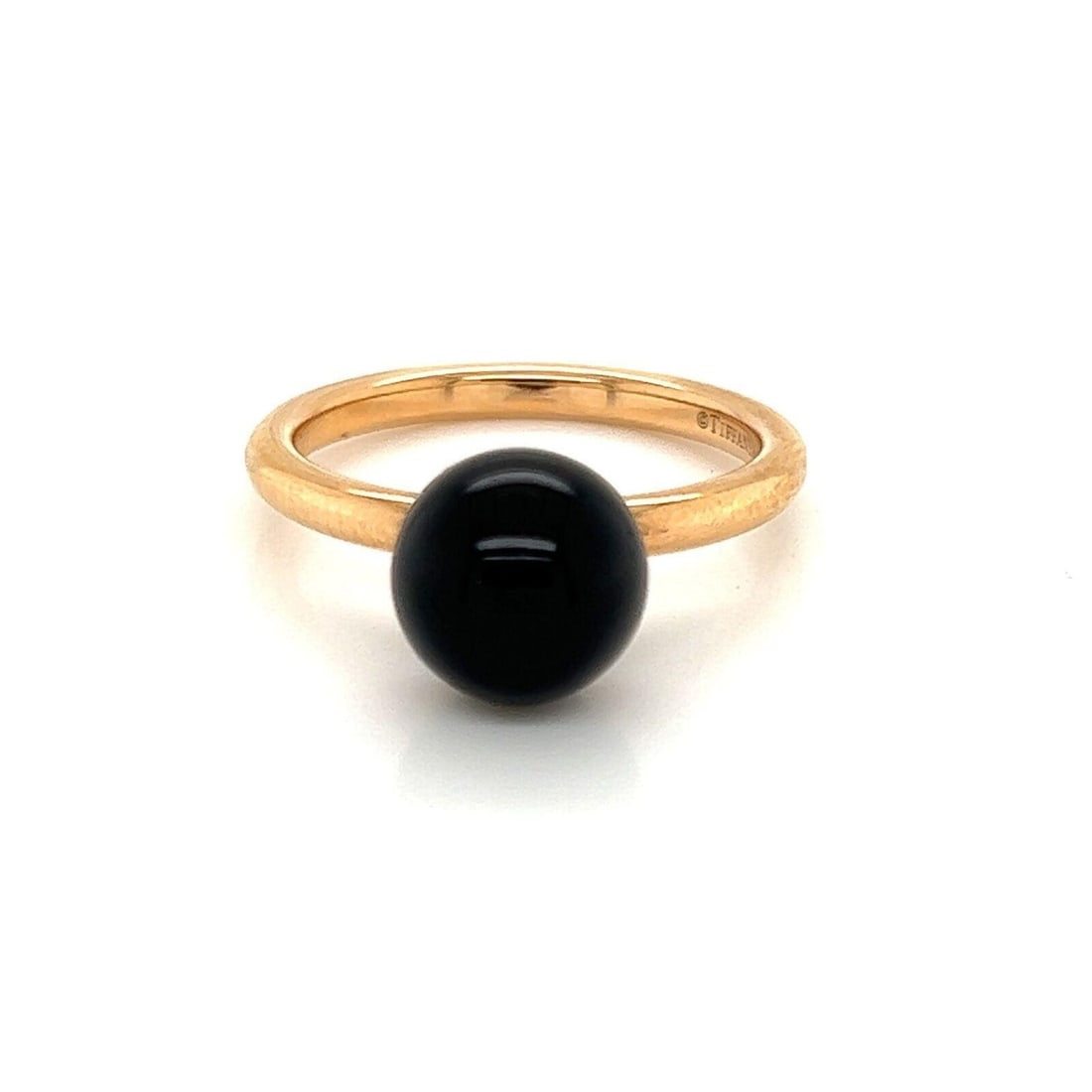 Tiffany HardWear 18k Rose Gold Onyx Solitaire Ring Size 4: Tiffany HardWear 18k Rose Gold Onyx Solitaire Ring Size 4 This Tiffany & Co. HardWear solitaire ring features a polished black onyx sphere set in solid 18k rose gold. The ring showcases a modern, scul