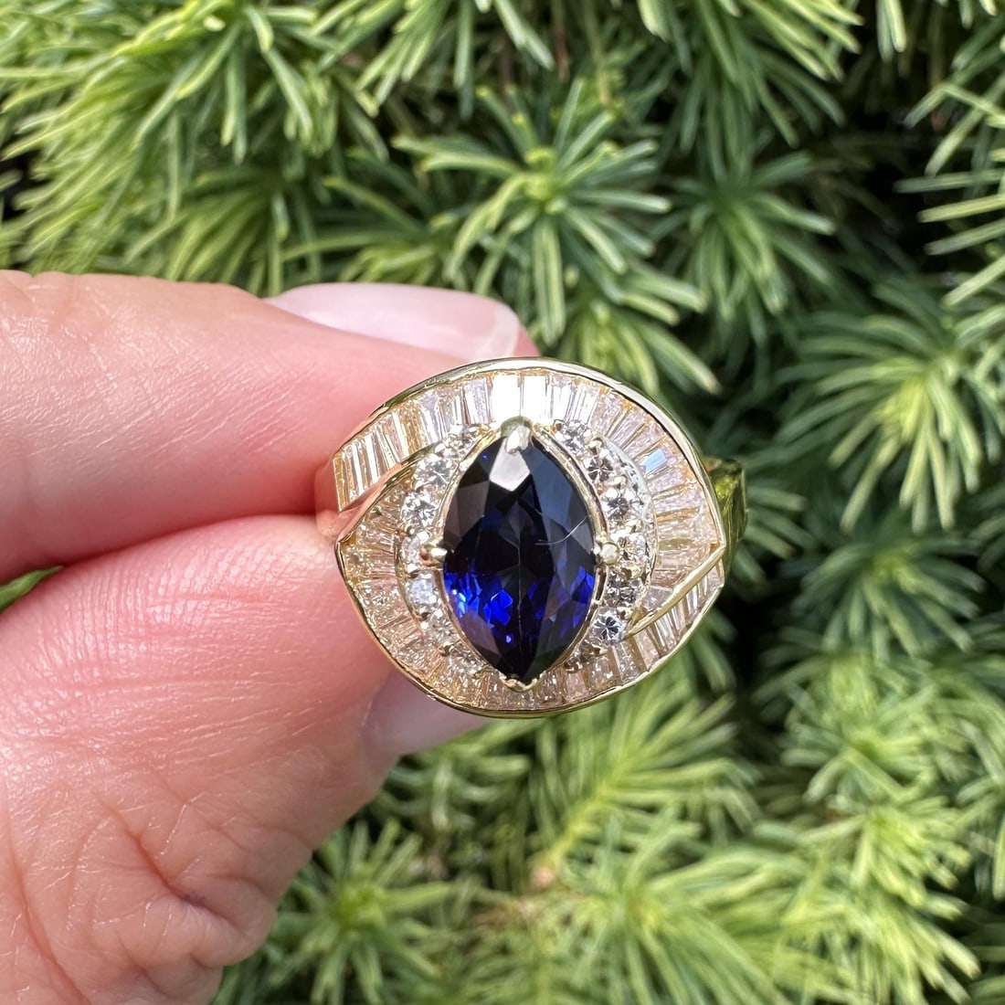 GIA marquise sapphire diamond swirl ring 18k yellow gold size 6: GIA marquise sapphire diamond swirl ring 18k yellow gold size 6 This elegant cocktail ring features a natural marquise brilliant cut sapphire with a deep royal blue color, sourced from Sri Lanka (Ceyl