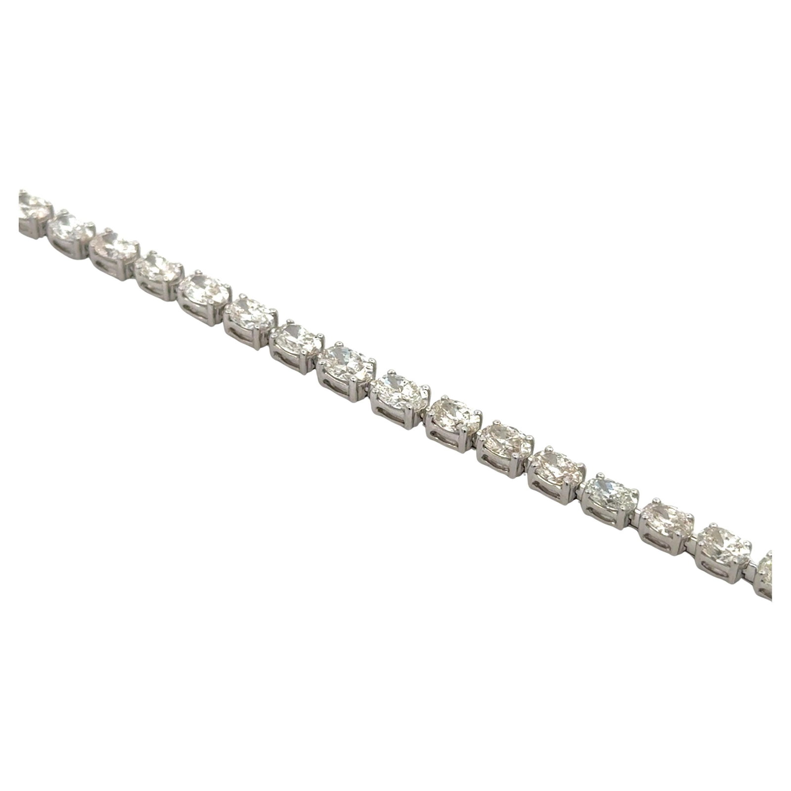 Harbor Diamonds 14KT White Gold Oval Cut Diamond Tennis Bracelet 6.62 Carats: Harbor Diamonds 14KT White Gold Oval Cut Diamond Tennis Bracelet 6.62 Carats This exquisite tennis bracelet showcases 34 oval cut diamonds totaling 6.62 carats, each averaging 0.195 points. Crafted fr