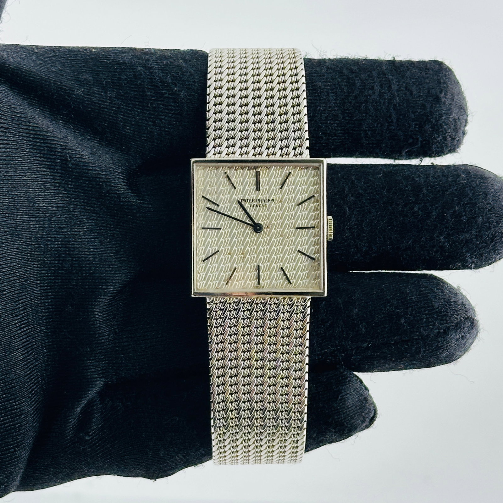 Patek Philippe Gondolo 3430 White Gold Mesh Bracelet: Patek Philippe Gondolo 3430 White Gold Mesh Bracelet This Patek Philippe Gondolo watch features a refined silver stick dial and is paired with a sophisticated white gold mesh bracelet. The fixed bezel