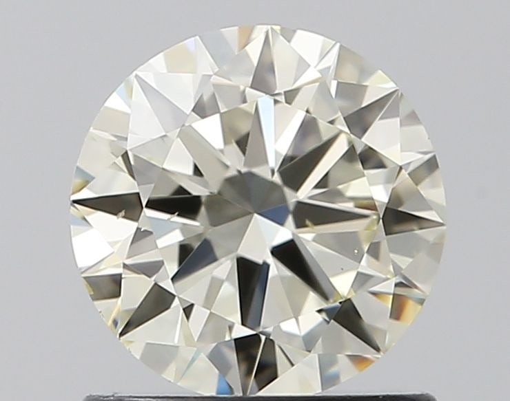 Loose Diamond - ROUND 0.9ct K VS2: Loose Diamond - ROUND 0.9ct K VS2 Source: Natural Shape: ROUND Carats: 0.9 Color: K Clarity: VS2 Certification: IGI Video: