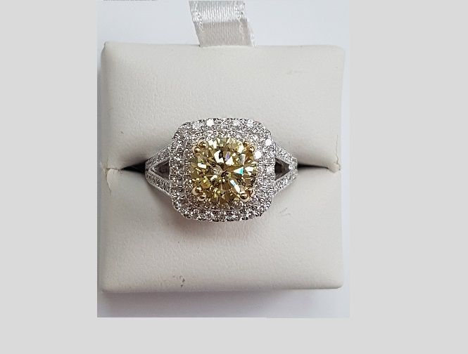 Loose Diamond - ROUND 2.01ct Fancy Yellow I1: Loose Diamond - ROUND 2.01ct Fancy Yellow I1 Source: Natural Shape: ROUND Carats: 2.01 Color: Fancy Yellow Certification: GIA PLEASE NOTE: Framed, Large, or heavy items do not have shipping costs incl