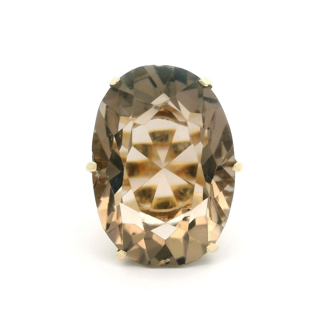 Vintage 14K Yellow Gold Smoky Quartz Cocktail Ring: Vintage 14K Yellow Gold Smoky Quartz Cocktail Ring This exquisite vintage cocktail ring features a stunning oval smoky quartz, elegantly set in a solid 14k yellow gold open basket design. The natural 