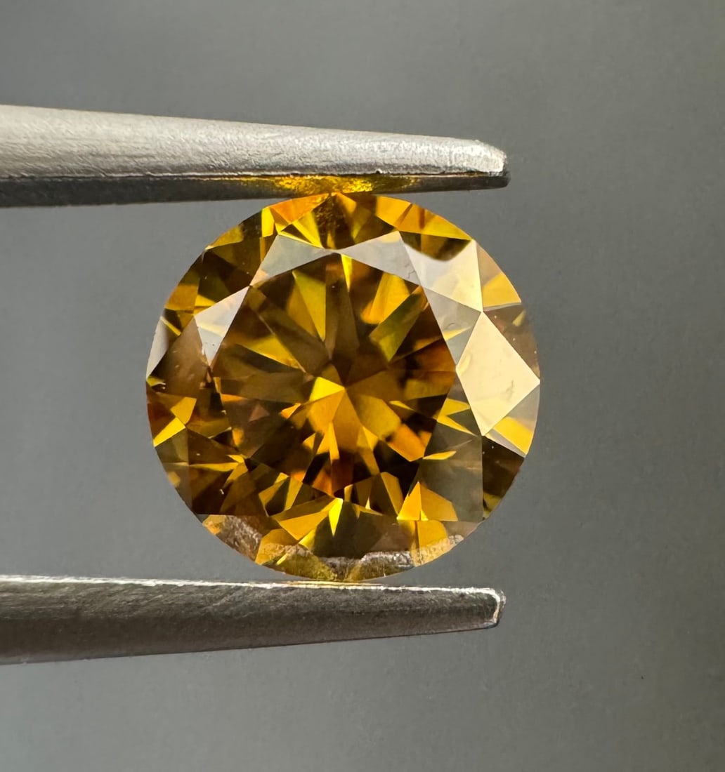 Loose Diamond - ROUND 0.53ct Fancy Deep Brownish Orangey Yellow SI1: Loose Diamond - ROUND 0.53ct Fancy Deep Brownish Orangey Yellow SI1 Source: Natural Shape: ROUND Carats: 0.53 Color: Fancy Deep Brownish Orangey Yellow Certification: GIA PLEASE NOTE: Framed, Large, o