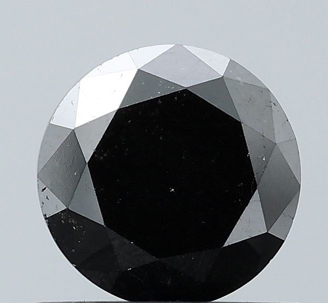 Loose Diamond - ROUND 0.86ct Fancy Black VVS2: Loose Diamond - ROUND 0.86ct Fancy Black VVS2 Source: Natural Shape: ROUND Carats: 0.86 Color: Fancy Black Certification: NONE Video: