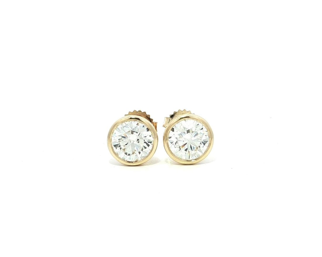 14k Yellow Gold GIA Certified 3.08ct J SI1 Martini Diamond Stud Earrings: 14k Yellow Gold GIA Certified 3.08ct J SI1 Martini Diamond Stud Earrings Discover the elegance of these 14k Yellow Gold Martini Bezel Stud Earrings featuring two stunning natural diamonds. Each round 