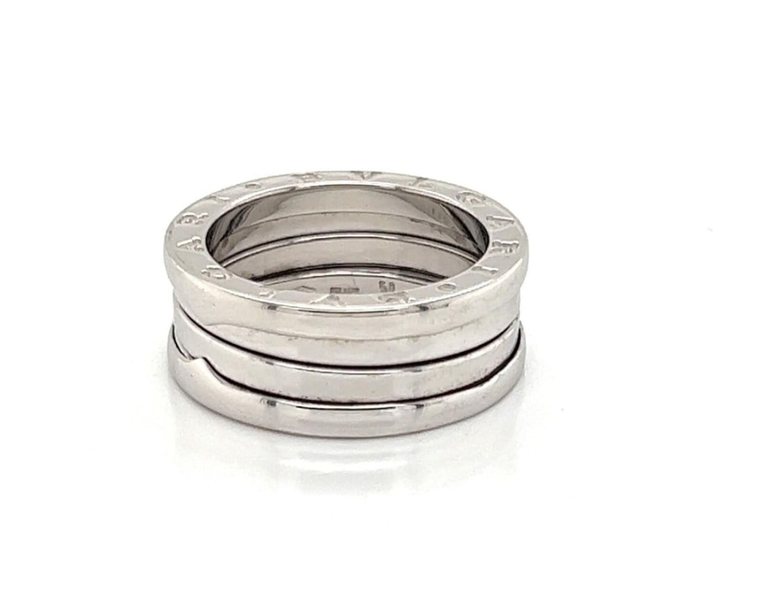 Bvlgari B.zero1 18k White Gold Band Ring EU 50 US 5: Bvlgari B.zero1 18k White Gold Band Ring EU 50 US 5 This authentic Bvlgari B.zero1 ring is crafted in solid 18k white gold and features the iconic triple spiral band design from the celebrated B.zero1