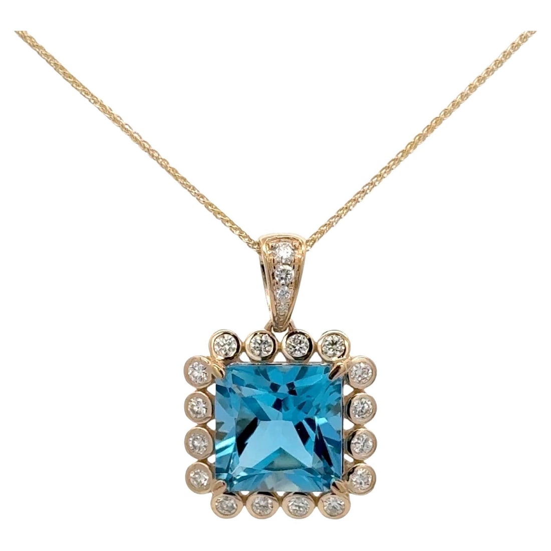 Harbor Diamonds Swiss Blue Topaz Diamond Pendant 5.70 Carats 14K Yellow Gold: Harbor Diamonds Swiss Blue Topaz Diamond Pendant 5.70 Carats 14K Yellow Gold This exquisite pendant showcases a stunning Swiss Blue Topaz, expertly cut in a radiant style, weighing 5.70 carats. Surrou