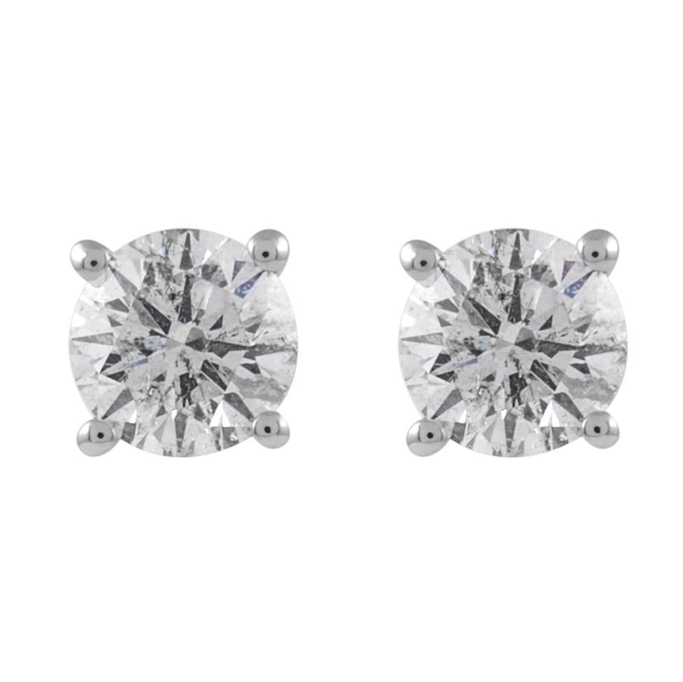 1.12ct Round Brilliant Diamond Stud Earrings in 18k White Gold: 1.12ct Round Brilliant Diamond Stud Earrings in 18k White Gold Elevate your elegance with these classic round diamond stud earrings, featuring two stunning round brilliant diamonds totaling 1.12 carat