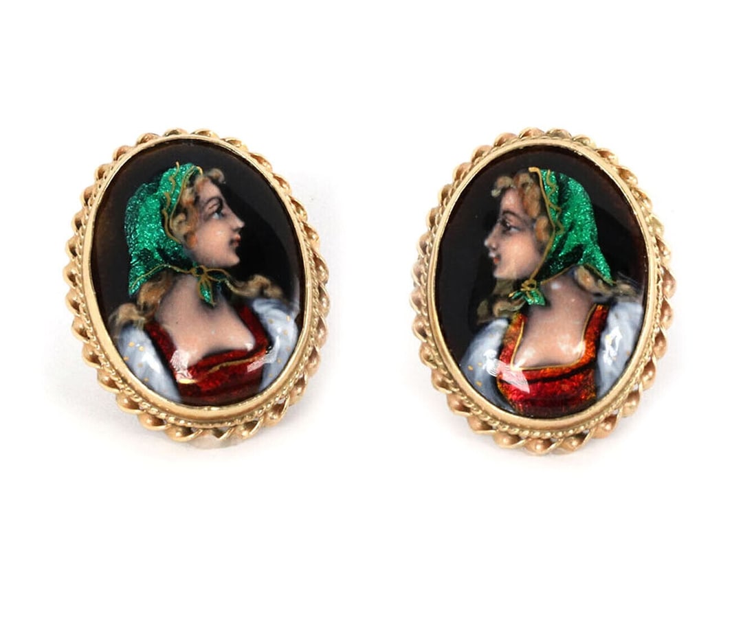 Ascione France 14k Gold Hand Painted Cameo Huggie Earrings: Ascione France 14k Gold Hand Painted Cameo Huggie Earrings These vintage earrings from Ascione France showcase finely detailed hand-painted enamel cameo portraits set in elegant oval frames. Crafted i