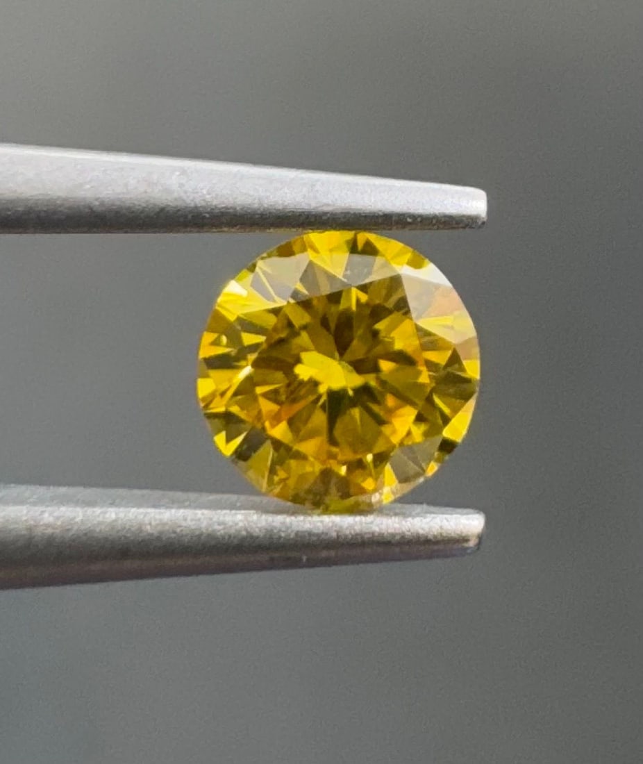 Loose Diamond - ROUND 0.21ct Fancy Vivid Orangey Yellow I1: Loose Diamond - ROUND 0.21ct Fancy Vivid Orangey Yellow I1 Source: Natural Shape: ROUND Carats: 0.21 Color: Fancy Vivid Orangey Yellow Certification: GIA PLEASE NOTE: Framed, Large, or heavy items do 