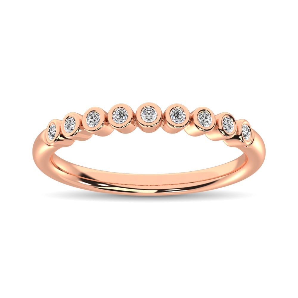 14K Rose Gold 1/10 Ct.Tw. Diamond Stackable Band: 14K Rose Gold 1/10 Ct.Tw. Diamond Stackable Band This glamorous stackable band is available in 14K Rose Gold. There are 9 round diamonds with a total carat weight of 1/10Ct.Tw. set in a bezel setting.