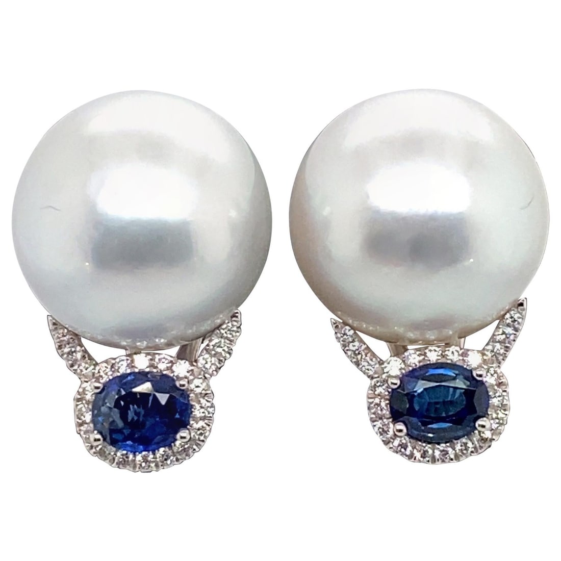 Harbor Diamonds Contemporary South Sea Pearl Diamond Sapphire Earrings: Harbor Diamonds Contemporary South Sea Pearl Diamond Sapphire Earrings These exquisite drop earrings are crafted from 18K white gold and feature two stunning South Sea pearls, each measuring 13-14 mm.