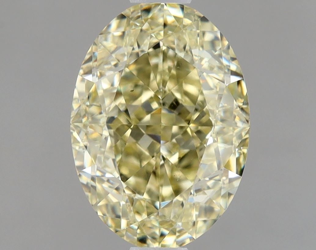 Loose Diamond - OVAL 1.52ct Fancy Light Yellow Brown VS2: Loose Diamond - OVAL 1.52ct Fancy Light Yellow Brown VS2 Source: Natural Shape: OVAL Carats: 1.52 Color: Fancy Light Yellow Brown Certification: GIA Video: Video Link PLEASE NOTE: Framed, Large, or
