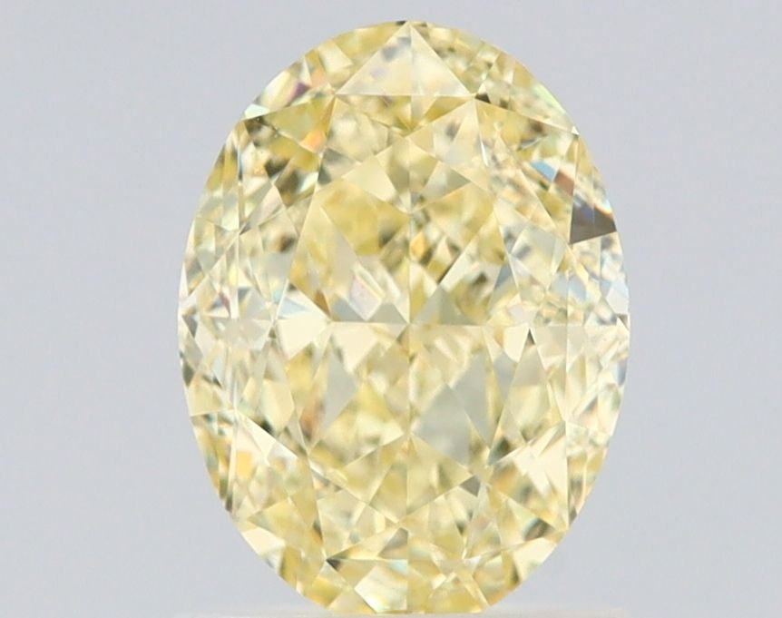 Loose Diamond - OVAL 1.51ct Fancy Light Yellow VVS1: Loose Diamond - OVAL 1.51ct Fancy Light Yellow VVS1 Source: Natural Shape: OVAL Carats: 1.51 Color: Fancy Light Yellow Certification: GIA Video: