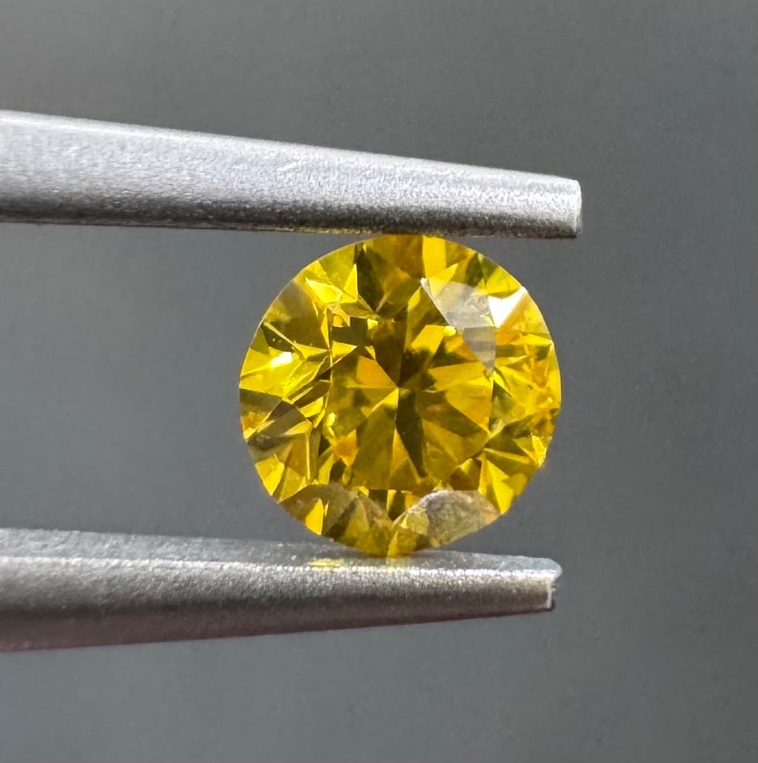 Loose Diamond - ROUND 0.2ct Fancy Vivid Yellow I1: Loose Diamond - ROUND 0.2ct Fancy Vivid Yellow I1 Source: Natural Shape: ROUND Carats: 0.2 Color: Fancy Vivid Yellow Certification: GIA PLEASE NOTE: Framed, Large, or heavy items do not have shipping 