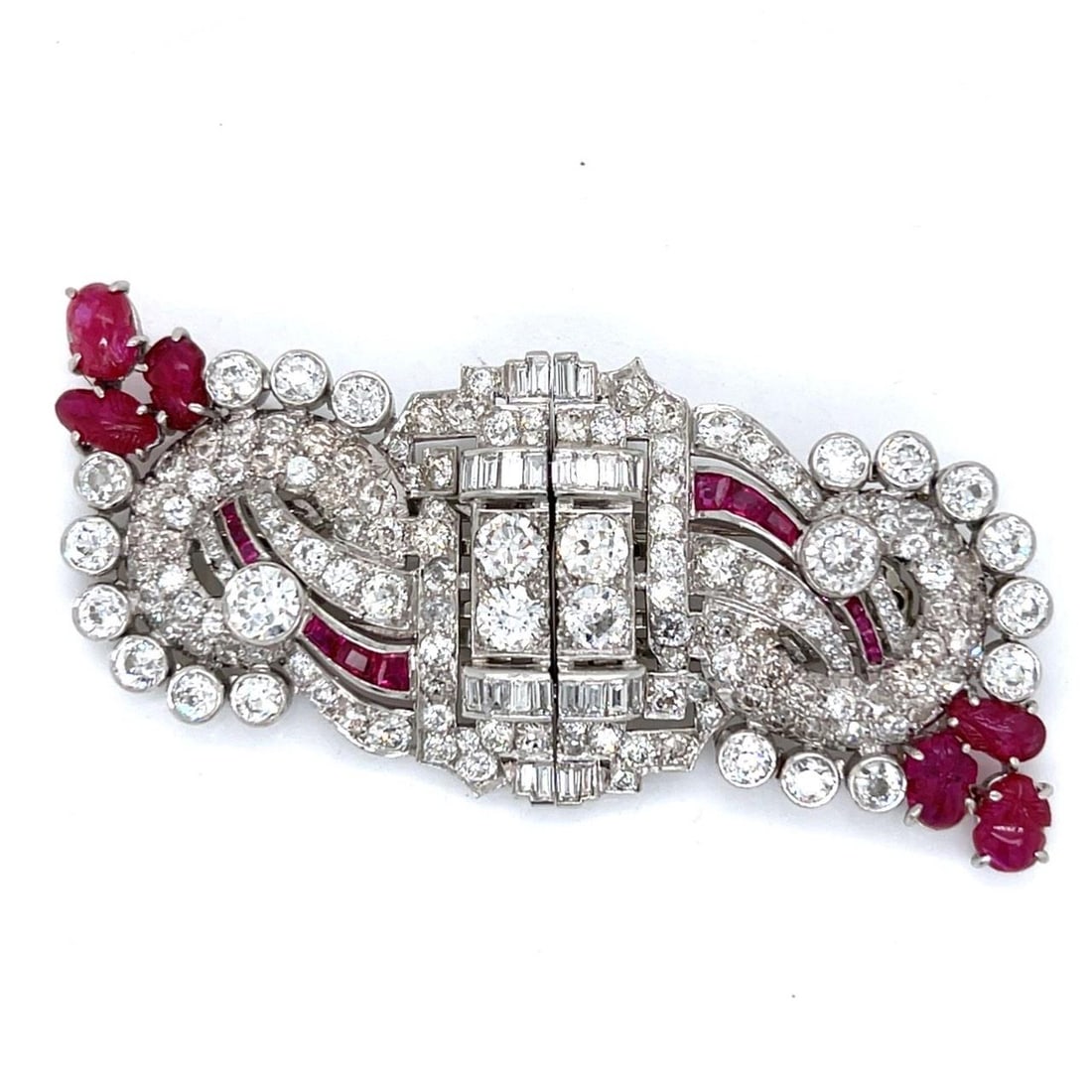 Art Deco Platinum Ruby Diamond Brooch 36.8g 20 Rubies 142 Diamonds: Art Deco Platinum Ruby Diamond Brooch 36.8g 20 Rubies 142 Diamonds This exquisite Art Deco brooch/clips is crafted in platinum, showcasing a stunning arrangement of Burma no-heat rubies and diamonds. 