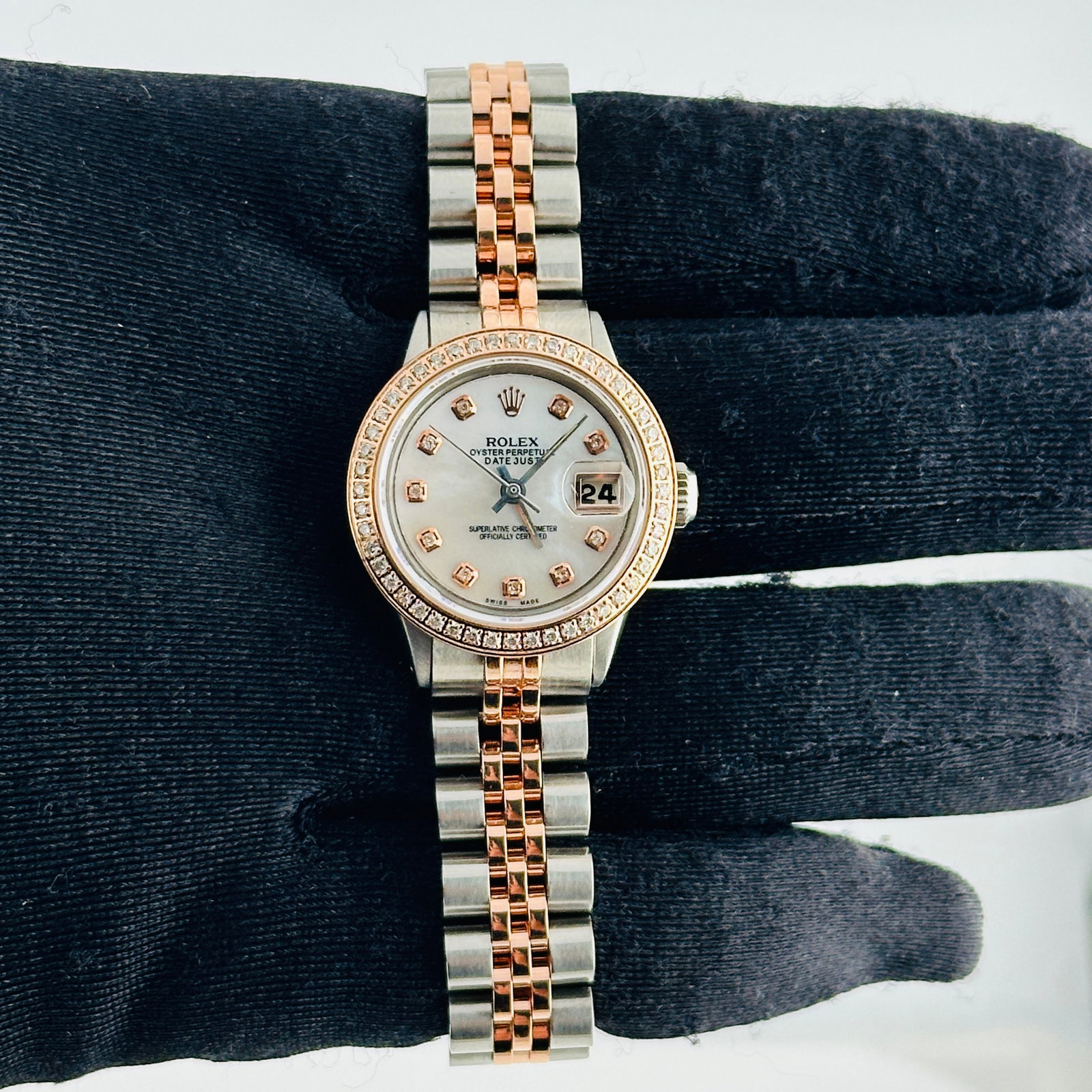 Ladies Rolex Datejust 6516 Aftermarket Diamond MOP Dial Jubilee Bracelet Watch: Ladies Rolex Datejust 6516 Aftermarket Diamond MOP Dial Jubilee Bracelet Watch This ladies Rolex Datejust features an aftermarket white mother-of-pearl diamond dial, a pave plated diamond bezel, and a