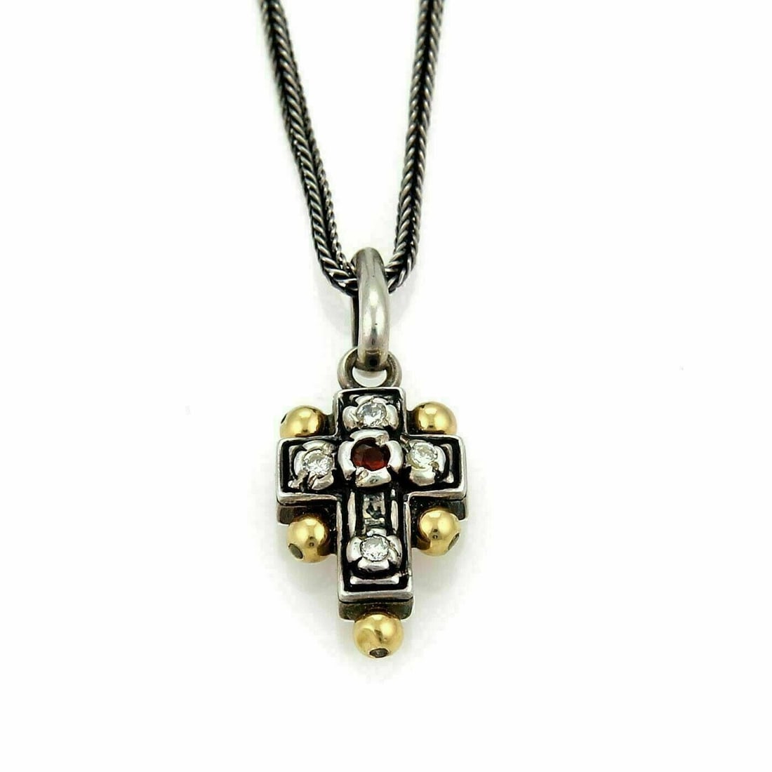 Konstantino cross pendant necklace sterling silver 18k gold diamonds rubies: Konstantino cross pendant necklace sterling silver 18k gold diamonds rubies This Konstantino necklace features a pendant crafted from sterling silver with 18k yellow gold accents. The elegant cross pe