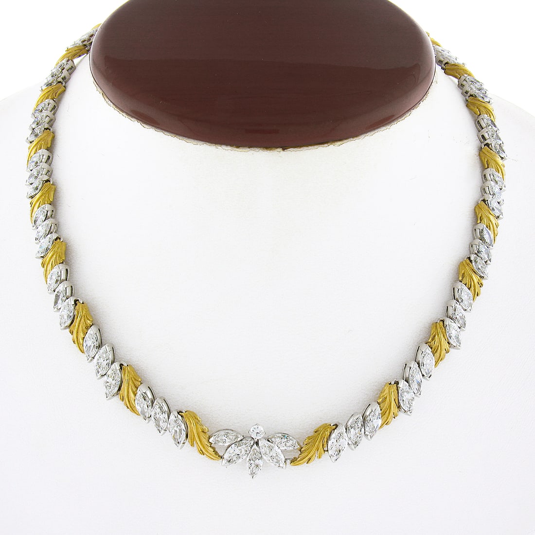 McTeigue Co platinum 18K gold diamond collar necklace 16 inch: McTeigue Co platinum 18K gold diamond collar necklace 16 inch This vintage McTeigue & Co. statement necklace features 14.15 carats of natural marquise and round brilliant cut diamonds set in solid pla