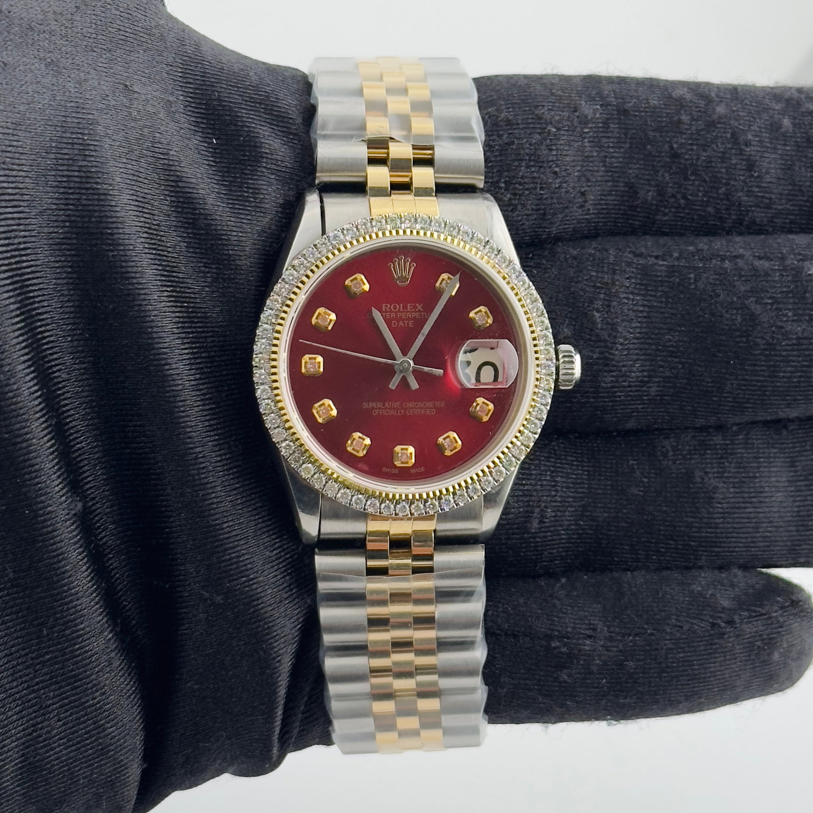 Red Diamond Dial Aftermarket Jubilee Rolex Datejust Ref 6694 Watch: Red Diamond Dial Aftermarket Jubilee Rolex Datejust Ref 6694 Watch This Rolex Datejust features a striking red diamond dial, complemented by a prong plated bezel and an aftermarket Jubilee bracelet. D
