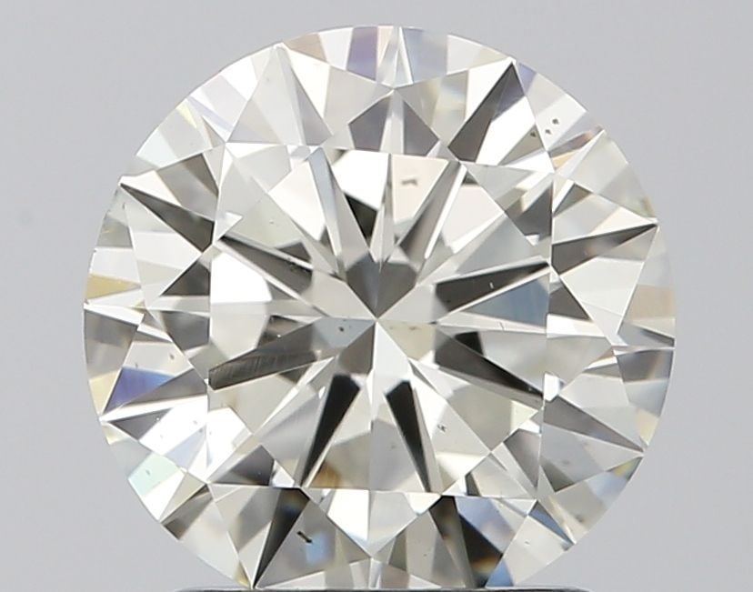 Loose Diamond - ROUND 1.52ct J VS2: Loose Diamond - ROUND 1.52ct J VS2 Source: Natural Shape: ROUND Carats: 1.52 Color: J Clarity: VS2 Certification: IGI Video: