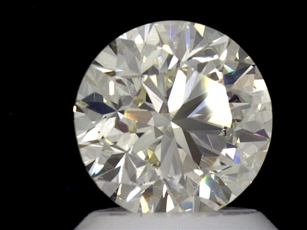 Loose Diamond - ROUND 1.5ct N VS2: Loose Diamond - ROUND 1.5ct N VS2 Source: Natural Shape: ROUND Carats: 1.5 Color: N Clarity: VS2 Certification: GIA Video: