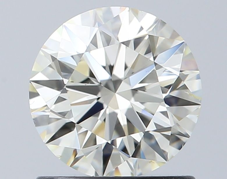 Loose Diamond - ROUND 1.01ct J VS2: Loose Diamond - ROUND 1.01ct J VS2 Source: Natural Shape: ROUND Carats: 1.01 Color: J Clarity: VS2 Certification: IGI Video: