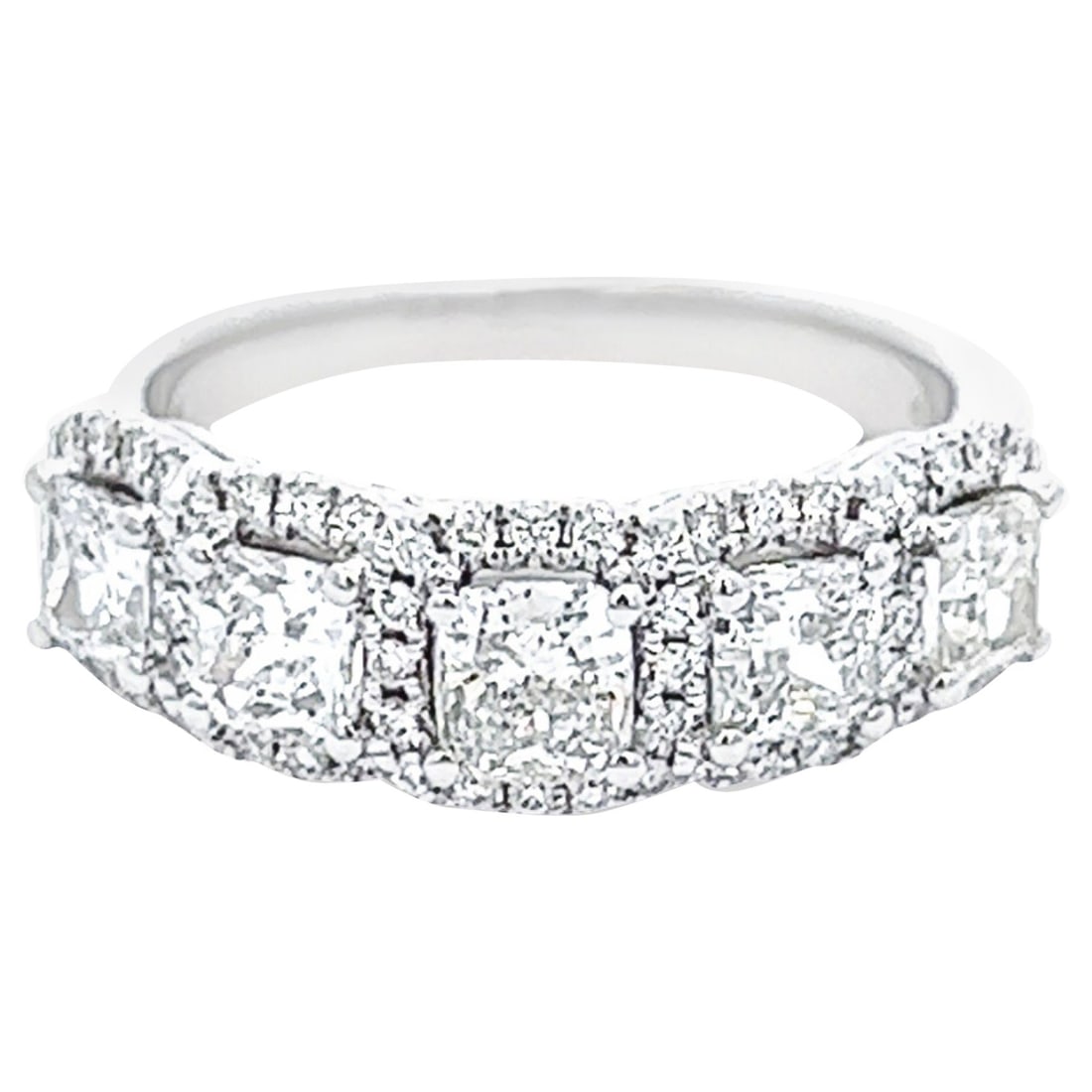 1.64ct Diamond Half Eternity Band 18k White Gold: 1.64ct Diamond Half Eternity Band 18k White Gold This stunning 1.64ct Cushion Diamond Half Eternity Band is crafted in 18k white gold and features a contemporary style. The ring showcases a total of f