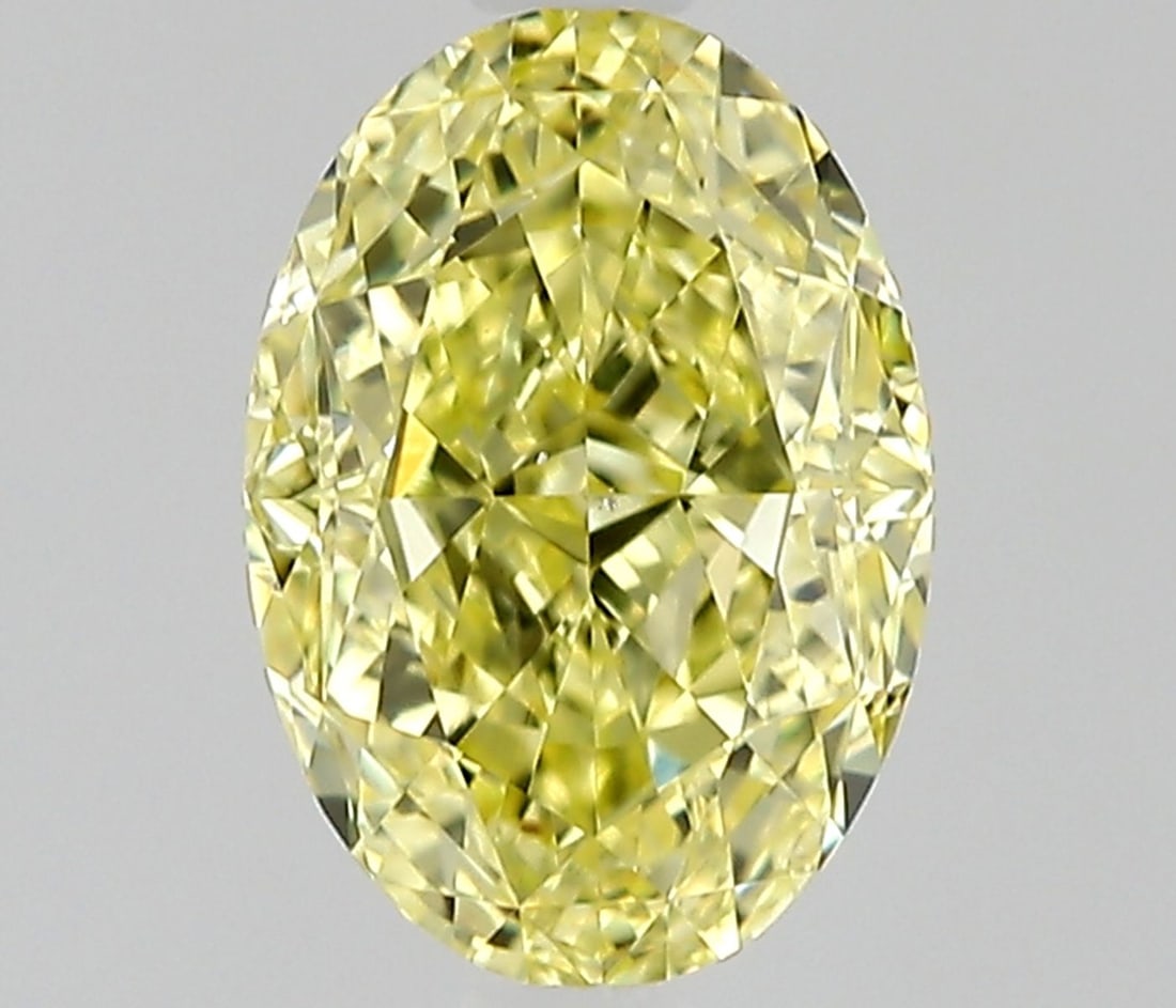 Loose Diamond - OVAL 0.9ct Fancy Yellow VS2: Loose Diamond - OVAL 0.9ct Fancy Yellow VS2 Source: Natural Shape: OVAL Carats: 0.9 Color: Fancy Yellow Certification: GIA Video: