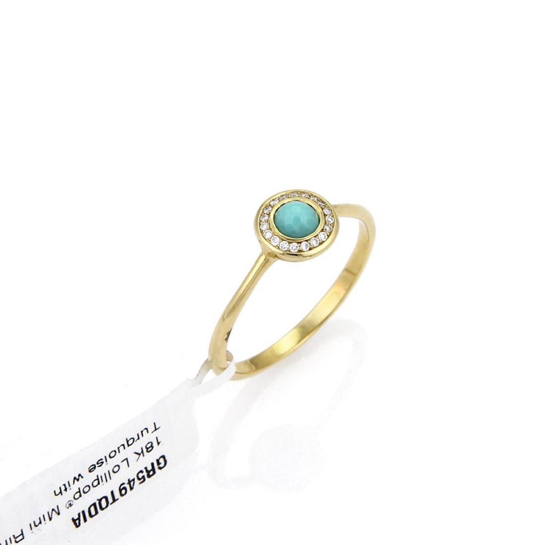 Ippolita Lollipop turquoise diamond 18k yellow gold mini ring size 7: Ippolita Lollipop turquoise diamond 18k yellow gold mini ring size 7 This Ippolita Lollipop mini ring features a vivid turquoise gemstone set in solid 18k yellow gold. The dome-shaped design is accent