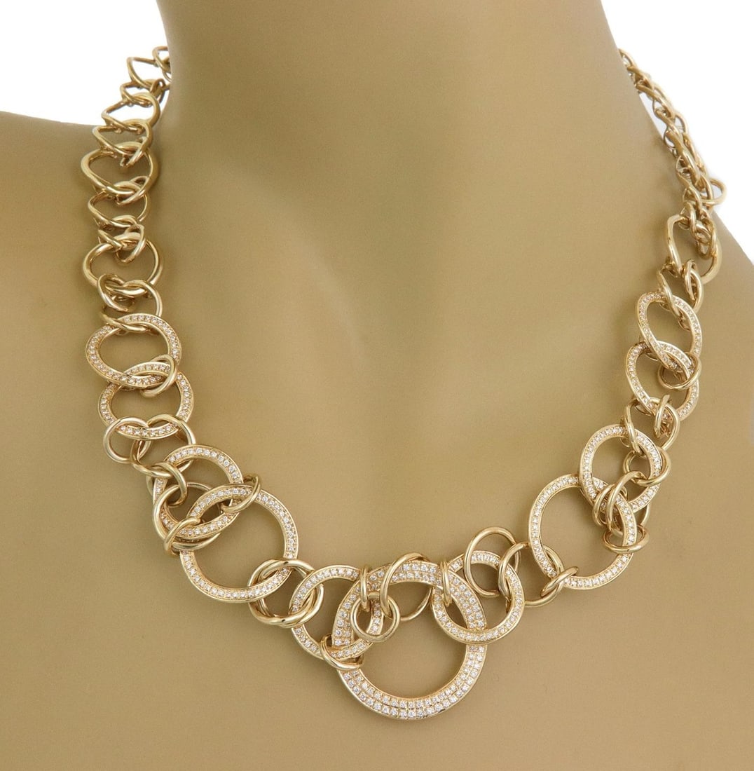 Di Modolo 18k Yellow Gold Tempia Necklace with Diamonds: Di Modolo 18k Yellow Gold Tempia Necklace with Diamonds This exquisite necklace by Di Modolo showcases a stunning design crafted from 18k yellow gold. It features an elegant arrangement of polished ri