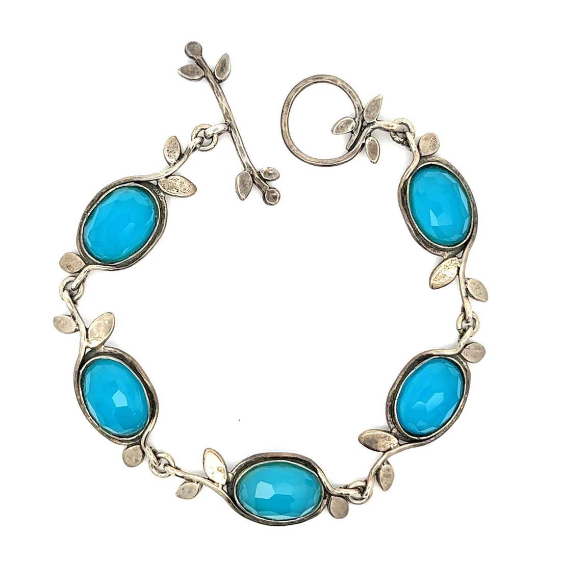 Handmade Sterling Silver Agate Olive Branch Toggle Bracelet 8 Inch: Handmade Sterling Silver Agate Olive Branch Toggle Bracelet 8 Inch This exquisite Handmade Bili Bracelet features a stunning design crafted from sterling silver, showcasing five natural genuine agate 