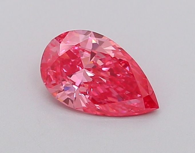 Loose Diamond - PEAR 0.54ct Fancy Vivid Pink VS1: Loose Diamond - PEAR 0.54ct Fancy Vivid Pink VS1 Source: This is a real non-mined Diamond that has been grown in a lab Shape: PEAR Carats: 0.54 Color: Fancy Vivid Pink Certification: IGI Video: