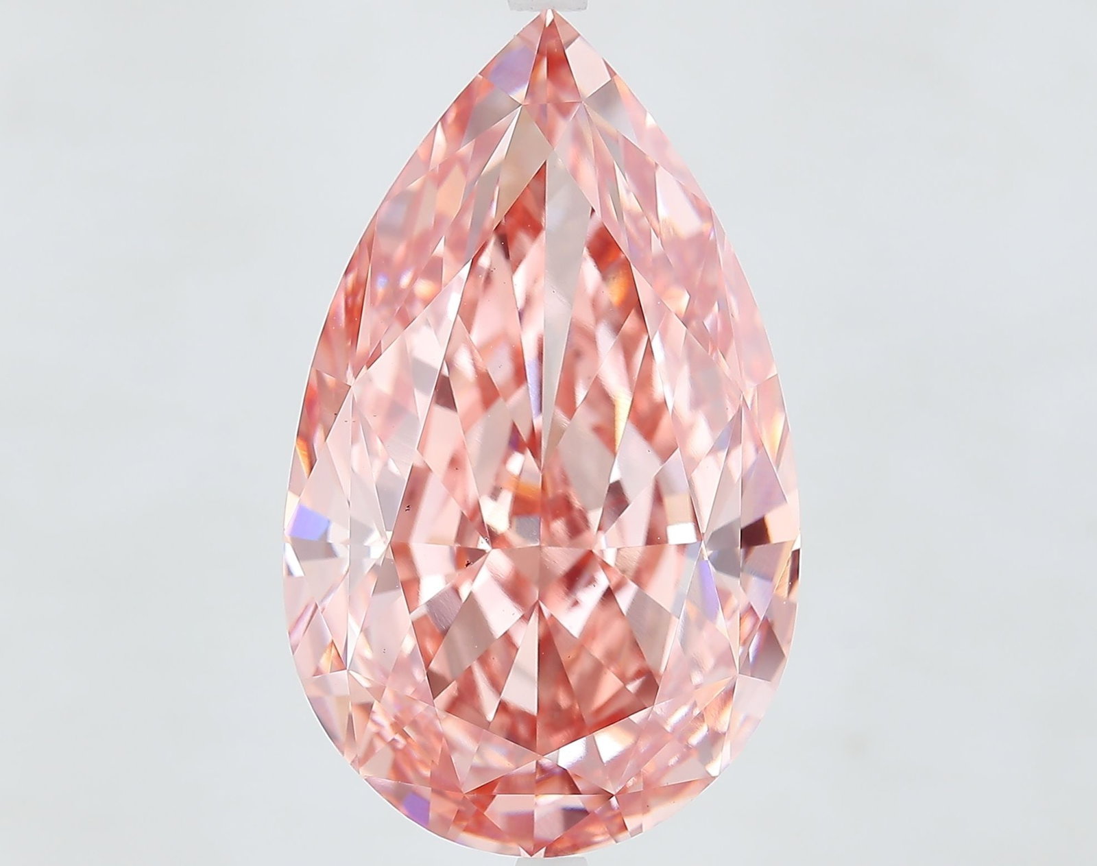 Loose Diamond - PEAR 20.1ct Fancy Vivid Pink VS1: Loose Diamond - PEAR 20.1ct Fancy Vivid Pink VS1 Source: This is a real non-mined Diamond that has been grown in a lab Shape: PEAR Carats: 20.1 Color: Fancy Vivid Pink Certification: IGI Video: