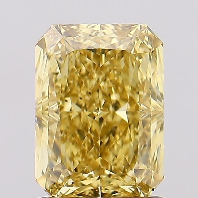 Loose Diamond - RADIANT 1.56ct Fancy Vivid Yellow VS1: Loose Diamond - RADIANT 1.56ct Fancy Vivid Yellow VS1 Source: This is a real non-mined Diamond that has been grown in a lab Shape: RADIANT Carats: 1.56 Color: Fancy Vivid Yellow Certification: IGI Vid