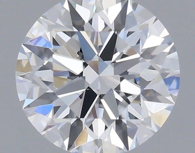 Ideal Loose Diamond - ROUND 0.69ct D VVS2: Ideal Loose Diamond - ROUND 0.69ct D VVS2 Source: This is a real non-mined Diamond that has been grown in a lab Shape: ROUND Carats: 0.69 Color: D Clarity: VVS2 Certification: IGI Video: