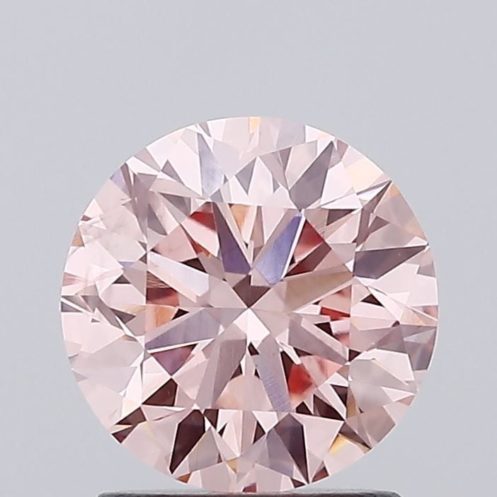 Loose Diamond - ROUND 1.51ct Fancy Vivid Pink VS2: Loose Diamond - ROUND 1.51ct Fancy Vivid Pink VS2 Source: This is a real non-mined Diamond that has been grown in a lab Shape: ROUND Carats: 1.51 Color: Fancy Vivid Pink Certification: IGI Video: