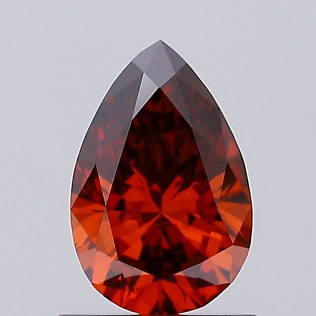 Loose Diamond - PEAR 0.64ct Fancy Deep Orange VS1: Loose Diamond - PEAR 0.64ct Fancy Deep Orange VS1 Source: This is a real non-mined Diamond that has been grown in a lab Shape: PEAR Carats: 0.64 Color: Fancy Deep Orange Certification: IGI Video: