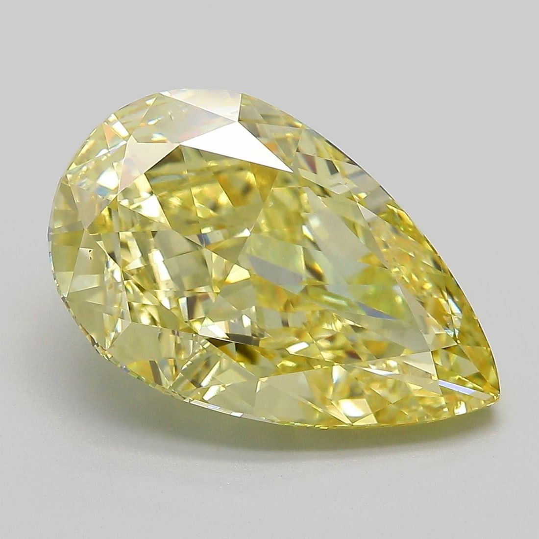 Loose Diamond - PEAR 7.08ct Fancy Intense Yellow VS1: Loose Diamond - PEAR 7.08ct Fancy Intense Yellow VS1 Source: This is a real non-mined Diamond that has been grown in a lab Shape: PEAR Carats: 7.08 Color: Fancy Intense Yellow Certification: IGI Video